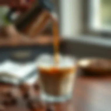 Brewed coffee being poured over ice with milk